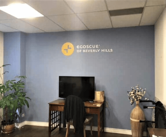 Egoscue sign on wall